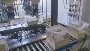 Système automatique de pesage de petits produits chimiques
