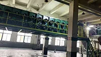 Machine batch-off de type suspendu