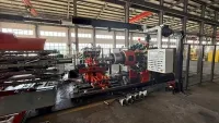 Machine de confection de pneus diagonaux