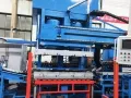 Machine de préconfection en caoutchouc