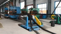 ligne de production pour bandes transporteuses à bords ondulés