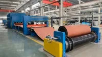 Ligne de vulcanisation pour bandes transporteuses à carcasse textile